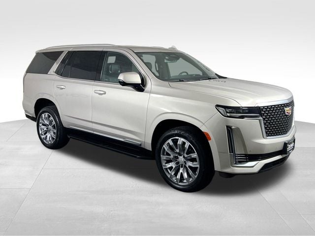 2022 Cadillac Escalade Luxury in Sandstone Metallic — front three-quarter view