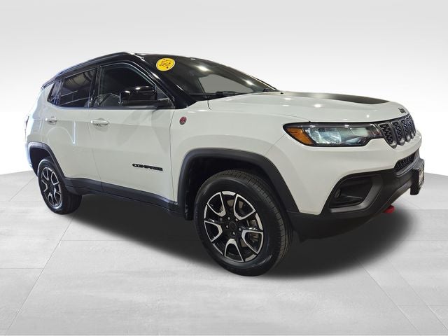 2025 Jeep Compass Trailhawk in Bright White Clearcoat — front three-quarter view