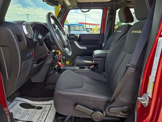2013 Jeep Wrangler — rear three-quarter view