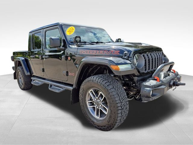 2024 Jeep Gladiator Mojave in Black Clearcoat — front three-quarter view