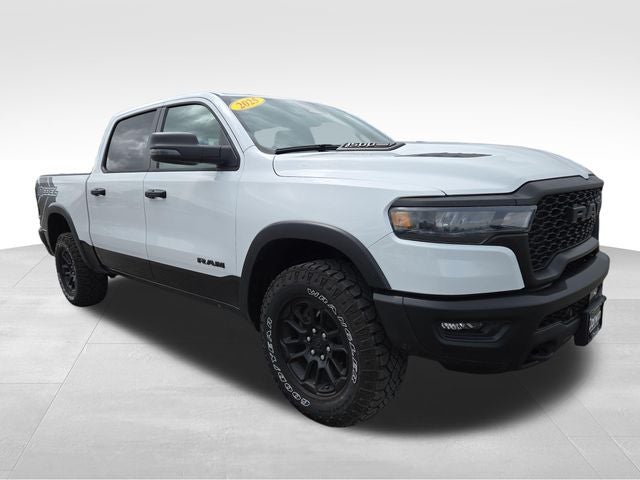 2025 RAM 1500 Rebel in Bright White Clearcoat — front three-quarter view