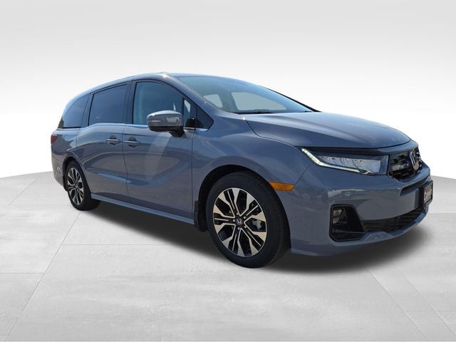 2026 Honda Odyssey Elite in Sonic Gray Pearl — front three-quarter view