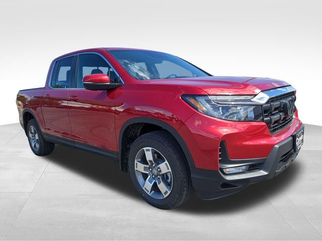 2026 Honda Ridgeline RTL in Dark Cherry Pearl — front three-quarter view
